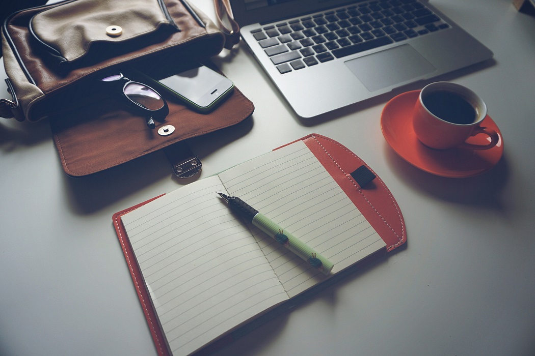 Lato and Notebook on a Worksace